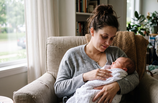 Exhausted new mom in the difficult first six weeks postpartum mental health recovery